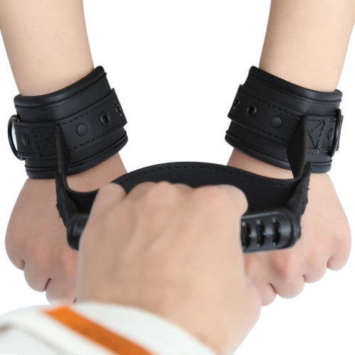 Handcuffs with handle for control and dominance