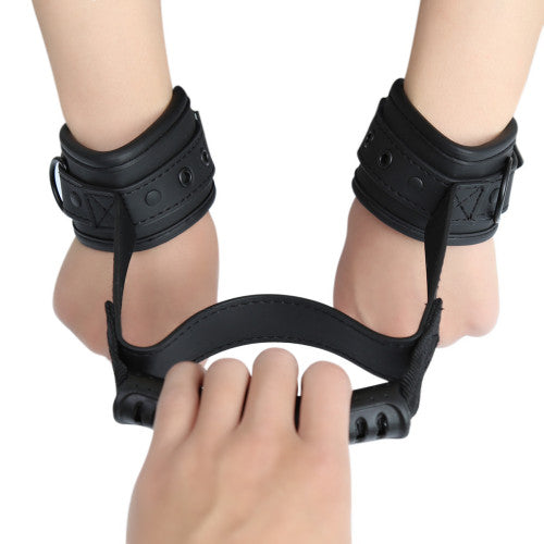 Handcuffs with handle for control and dominance